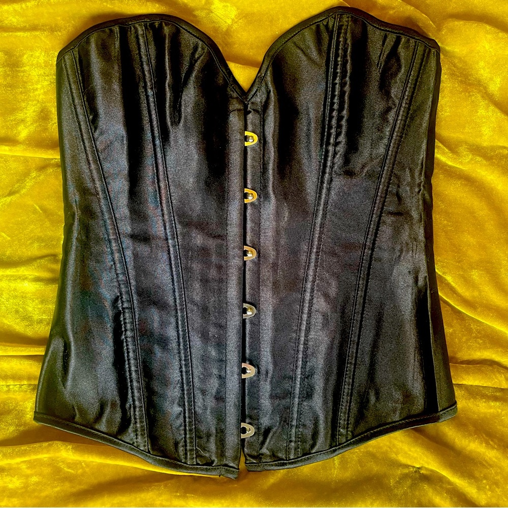 Vintage lined satin Boned Corset with front metal closures and lace up back.